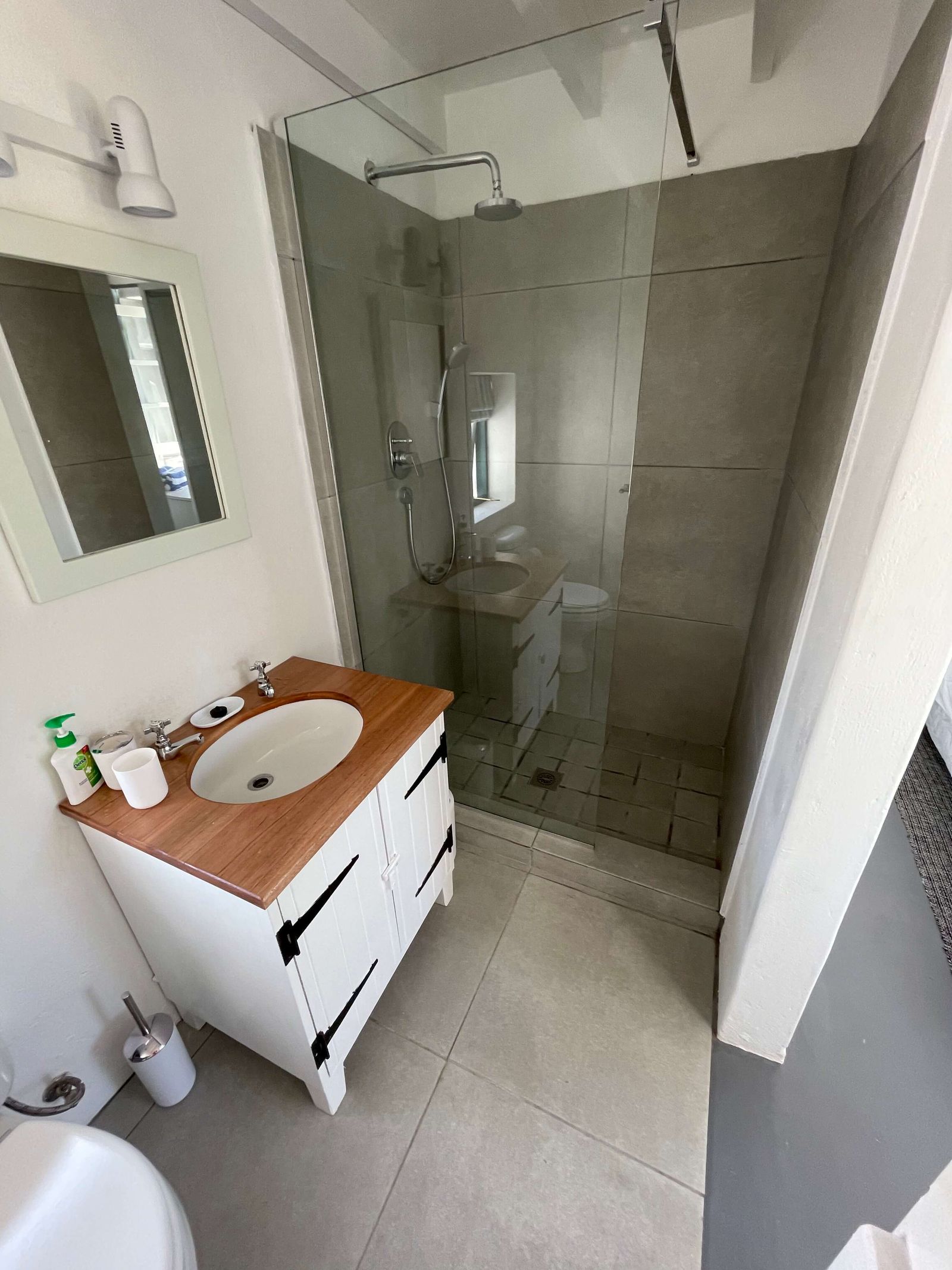 The private ensuite off the Oceanpearl Room at Cape Creek Retreat, with its walk-in shower